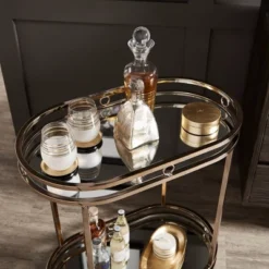 Bartram Oval Bar Cart Champagne Gold - Inspire Q 12 Bartram Oval Bar Cart Champagne Gold - Inspire Q -Baxton Home Shop GUEST 3451539e 91ab 4d0f 9261 93a8e678abe8