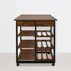 28" Solid Wood Rolling Kitchen Cart With Wine Rack And Drawer Dark Brown - Flora Home -Baxton Home Shop GUEST cd84cf23 e77e 44cd 82b2 c3cbbc5443cf