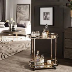 Bartram Oval Bar Cart Champagne Gold - Inspire Q 11 Bartram Oval Bar Cart Champagne Gold - Inspire Q -Baxton Home Shop GUEST dc77bf35 9ded 4c66 95ff c6b25e0765da